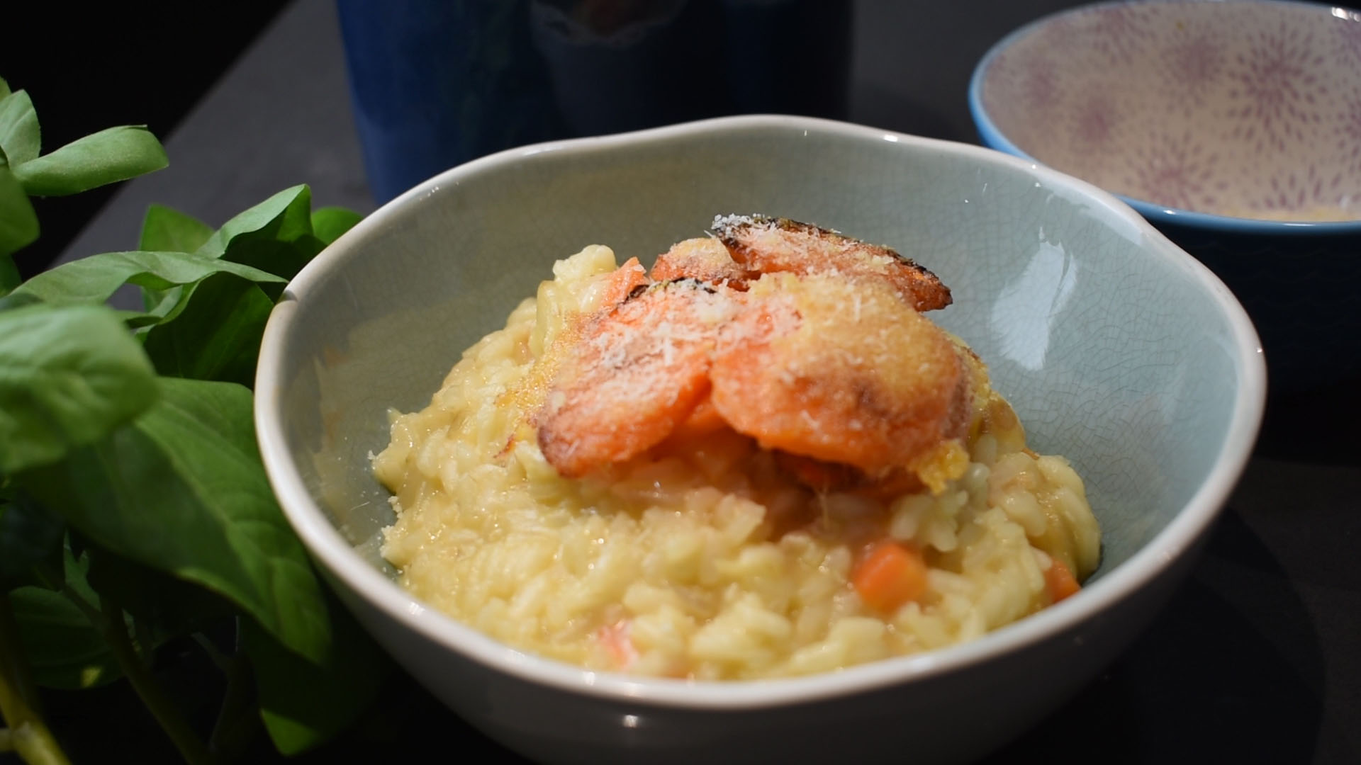 Carrot risotto with roasted parmesan carrots on top